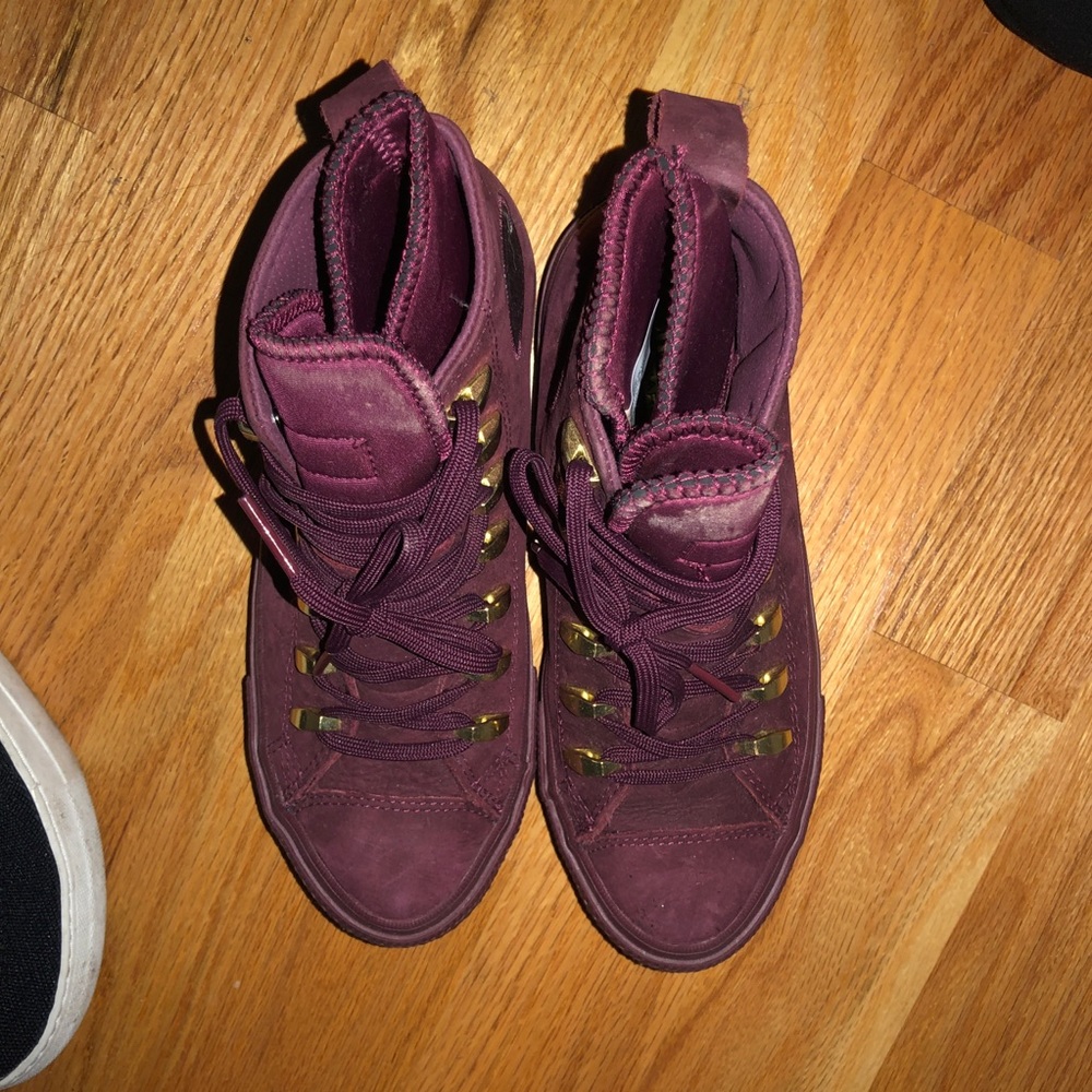 Converse high tops with gold accent